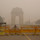 Delhi policemen stand guard at the India Gate in Delhi. (Image: AP)